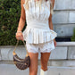 The AK Strapless Flare Top