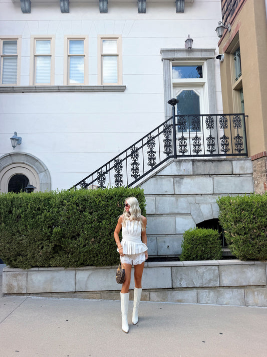 The AK Strapless Flare Top