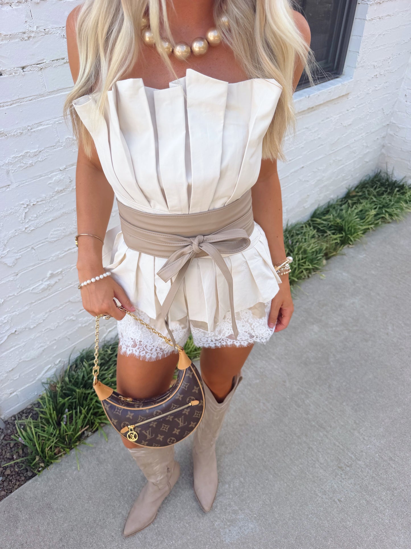 The AK Strapless Flare Top