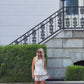 The AK Strapless Flare Top